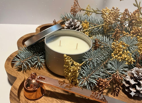 Hand-poured blue spruce scented  candle in a 6 oz tin vessel