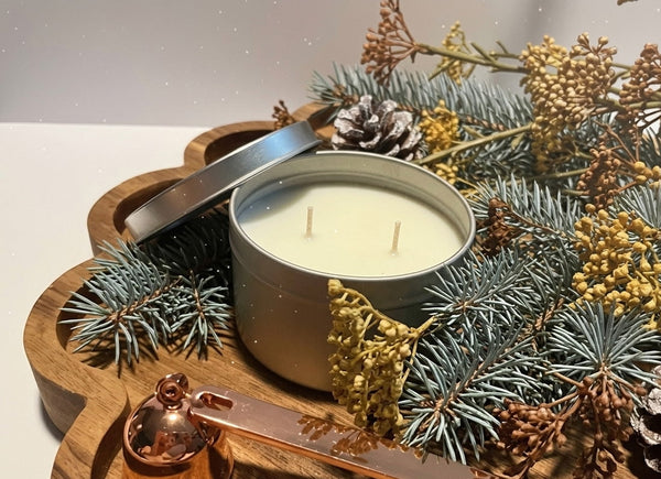 Hand-poured blue spruce scented  candle in a 6 oz tin vessel