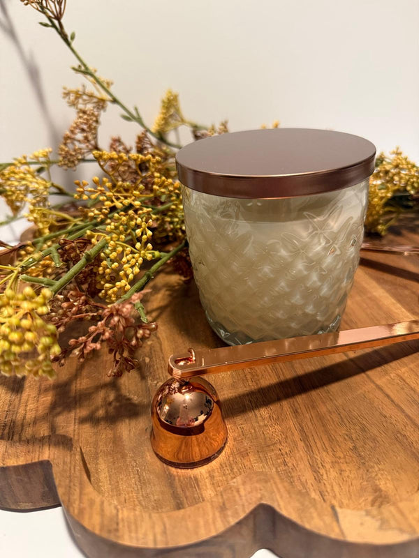 Frankincense and Myrrh candle in an embossed glass vessel with metallic lid made from clean burning coconut apricot wax