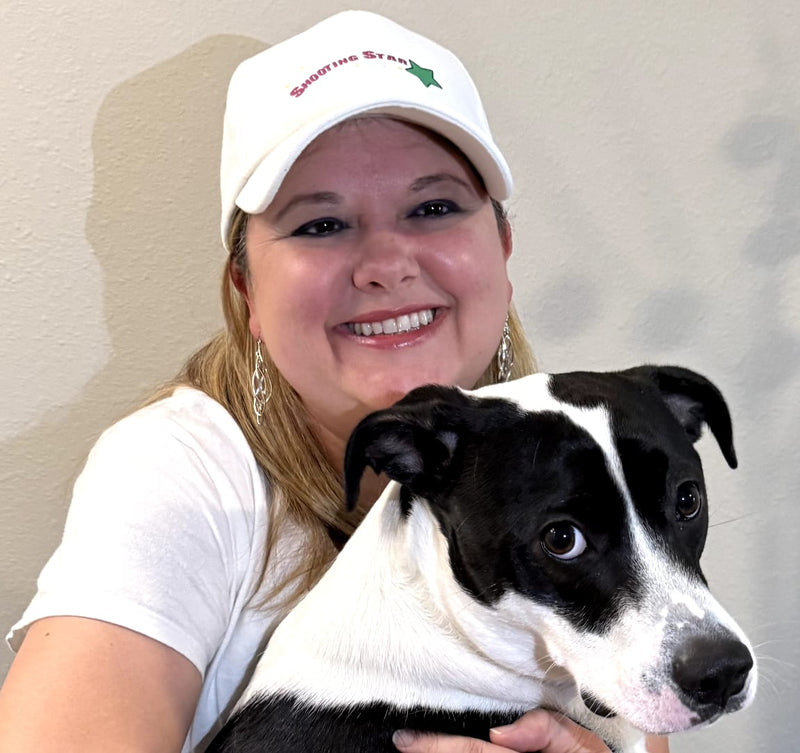 Michelle Sawyer founder of Shooting Star Products with her dog, reflecting the brand's family and pet friendly values